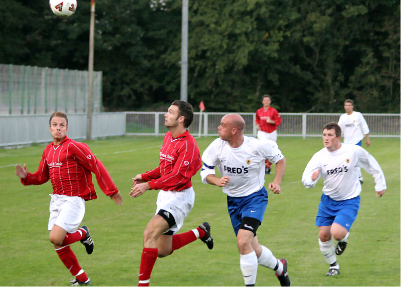 Matt Huckett, Dave Walker, Tony Miles and Lee Howard chase the ball
