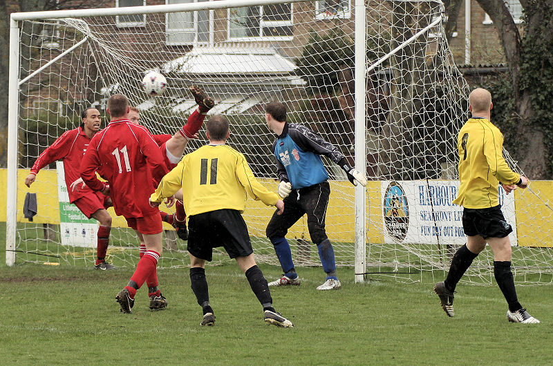 ... and Stuart Channon attempts to hack the ball clear but it's 1-0 to Littlehampton
