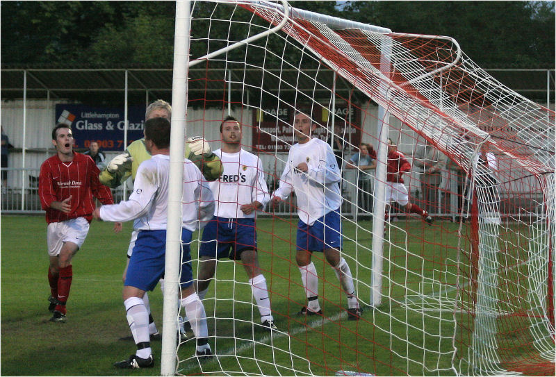 Lee Howard makes a vital clearance at the near post
