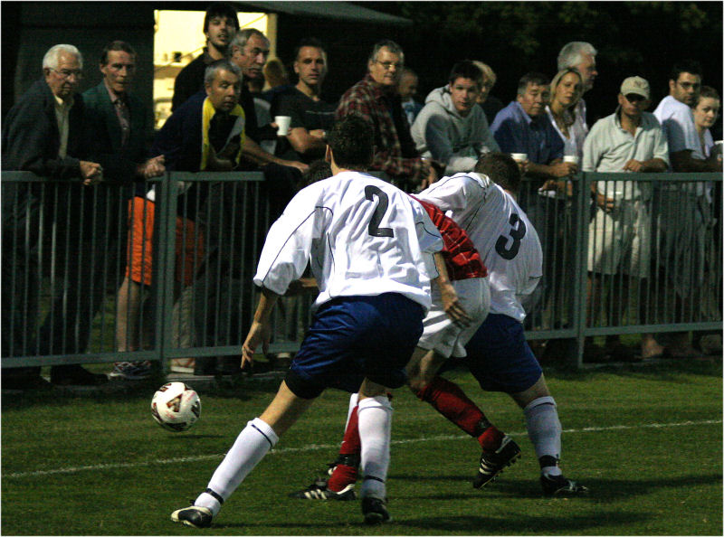 Lee Howard (3) puts the ball out with Ollie Howcroft (2) backing up
