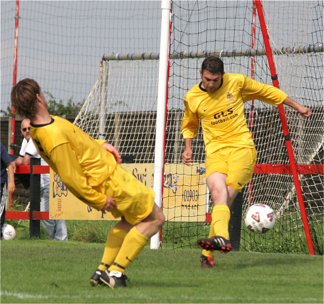 ... but Andy Lutwyche clears off the line
