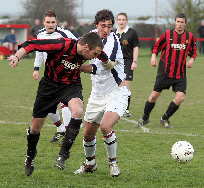 Chris Morrow tussles with Liam O'Brien
