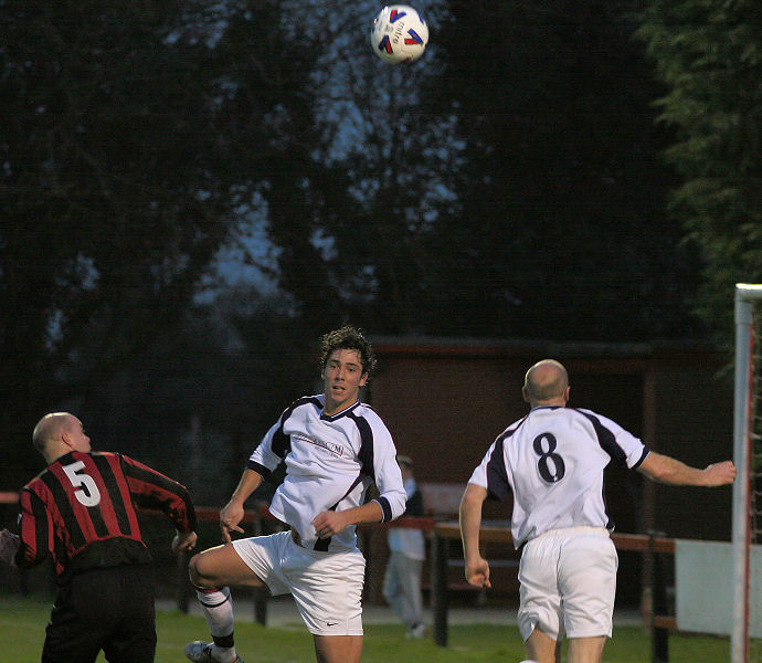 Tony Miles heads clear of Liam O'Brien and Steve Pickles
