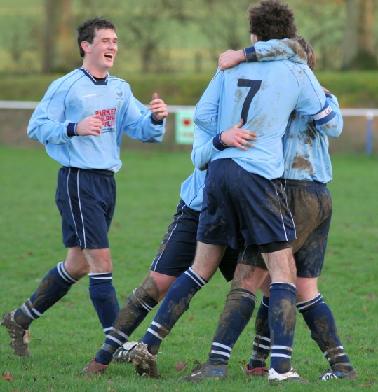 Wealden celebrate Adam Parker's equaliser
