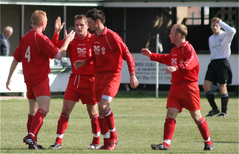 ... and is congratulated by his team mates
