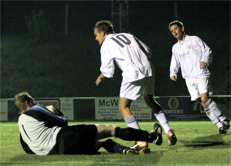 United keeper Dean Fuller intercepts this attempt by Ryan Dick
