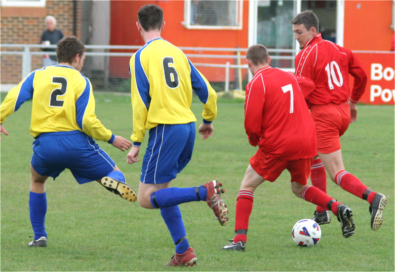 James Bywater (2) and Tom Rowe (6) watch as Mike Morgan (7) and Matt Dean (10) get the ball forward
