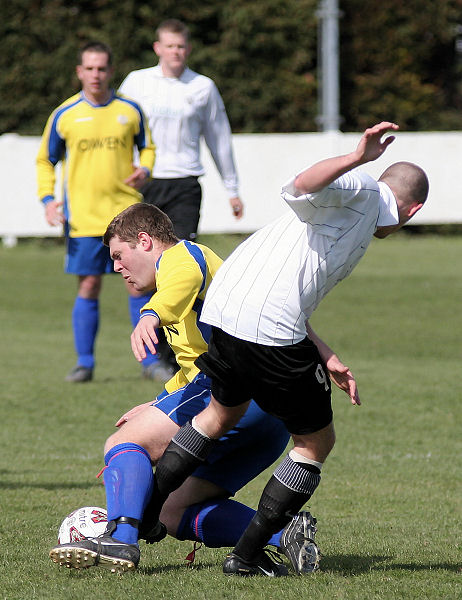 John Piercy is tackled by Josh Biggs
