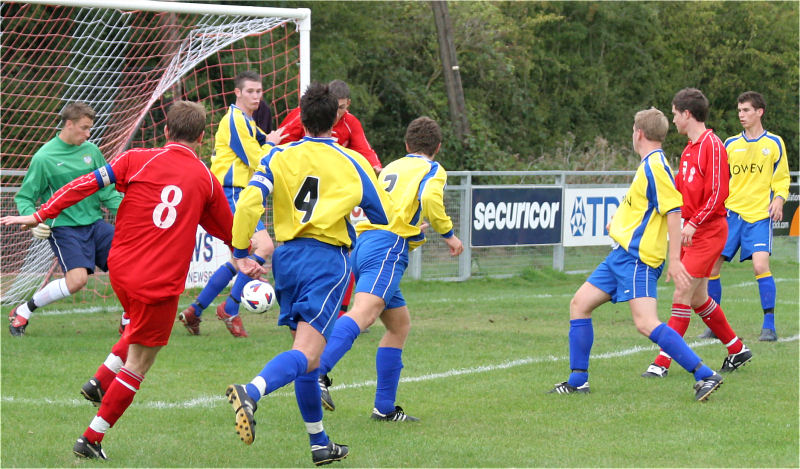 This Redhill attempt is cleared, in the action are keeper Paul Stark, Justin Jones (8), Tom Rowe, Matt Dean, Adam Davidson (4) and James Bywater (2)
