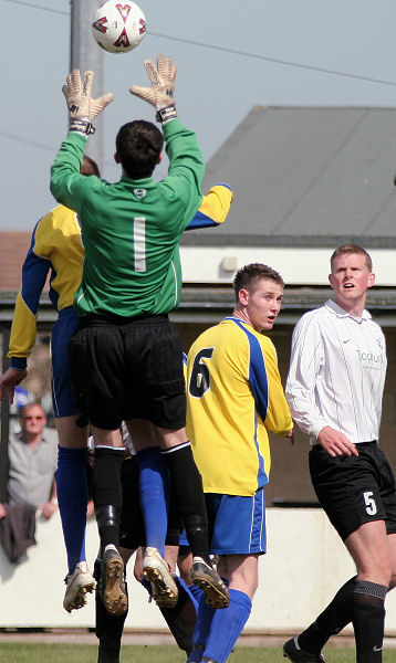 Greg Nessling cuts out a high cross
