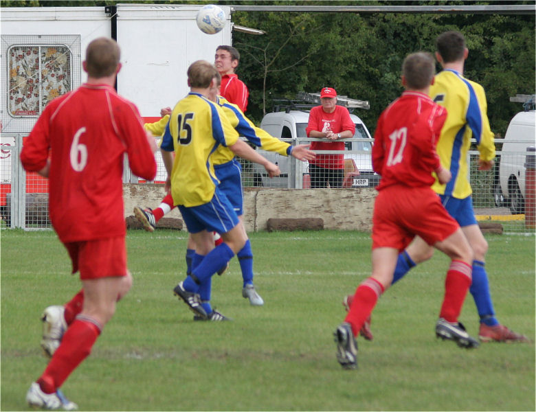 Jamie Dean heads away watched by Geoff Clark (6), Sheldon Snashall (15), Ben Biggar (12), Mike Watkin (5-hidden) and Tom Rowe (6)
