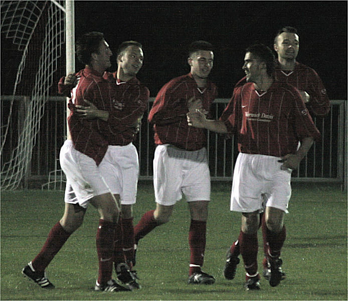 Matt Huckett is congratulated on opening the scoring
