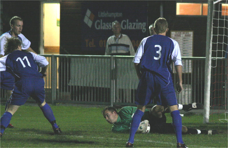 Ben O'Connor takes control in this goalmouth scramble with Tommy Pattenden (11) and Lee Newman (3) lurking
