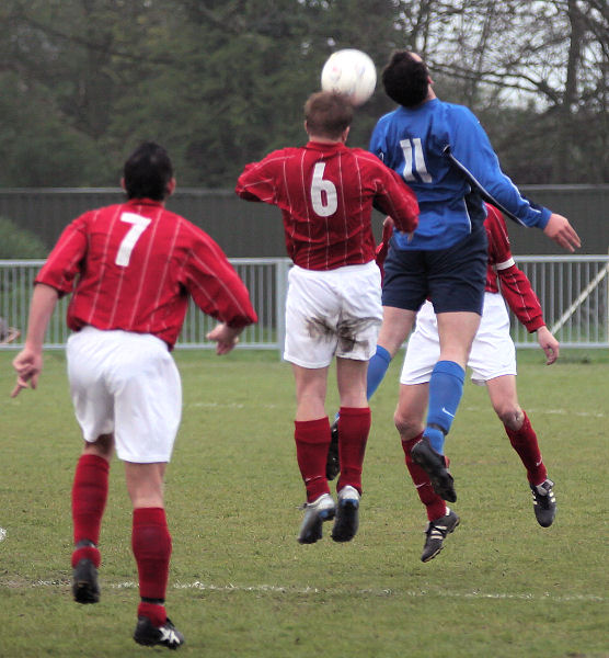 Duncan Barnes jumps with Pete Christodoulou
