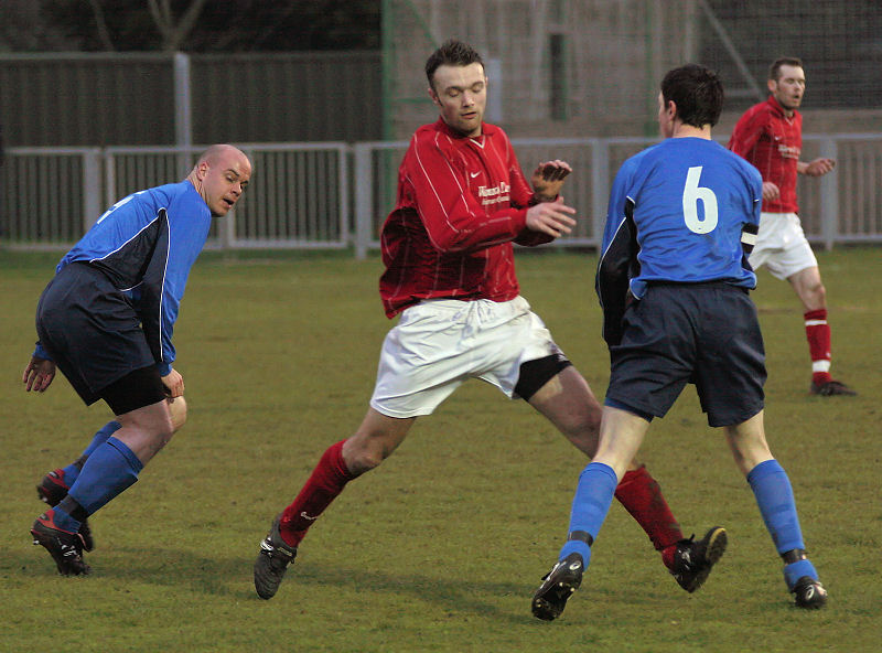 Dave Walker goes between Tony Miles and Dave Sharman
