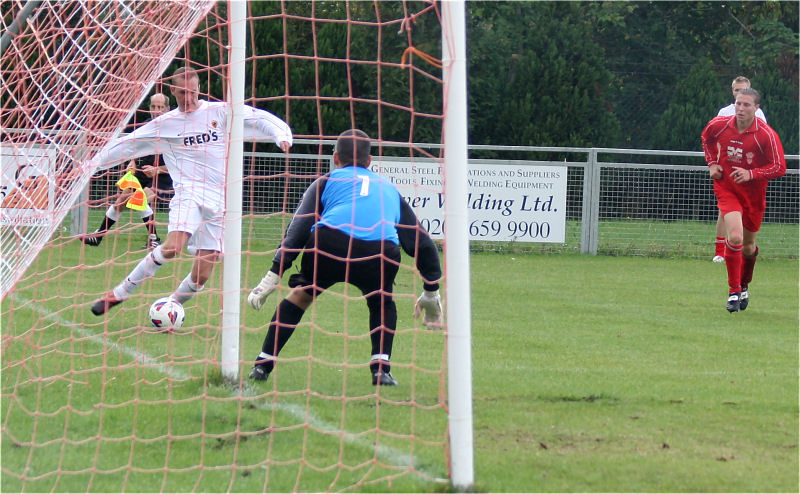 Paul Hodder gets the ball across from the line
