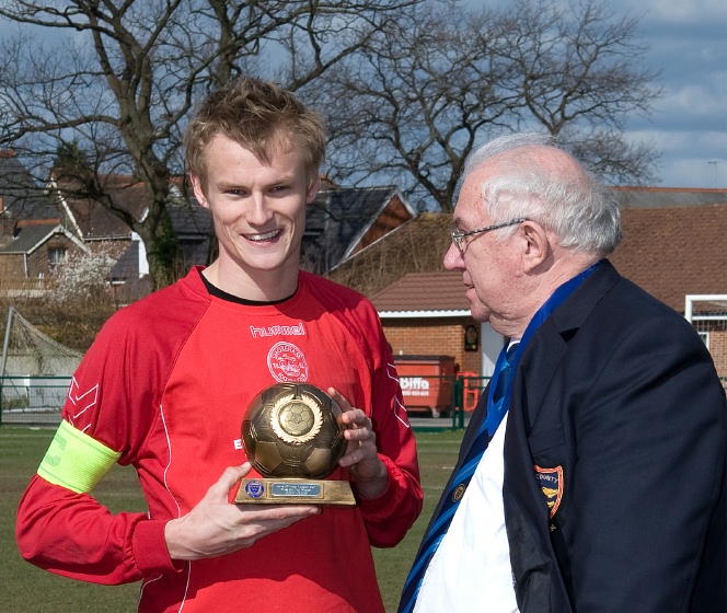 Matt Hurley gets Man of the Match award from Peter Bentley
