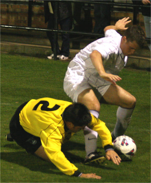 Paul Williams (2) tackles Dave McArthy
