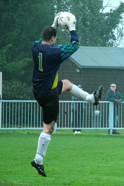 A comfortable catch for Redhill keeper Chris Roberts
