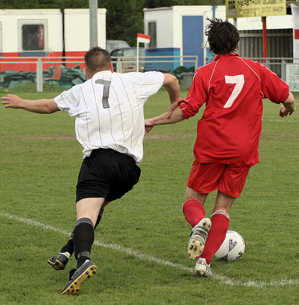 Seb Keet tries to win the ball from Stephen Gillett
