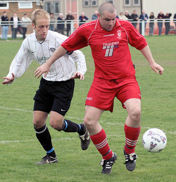 Luke Jones is shadowed by Dave Hall
