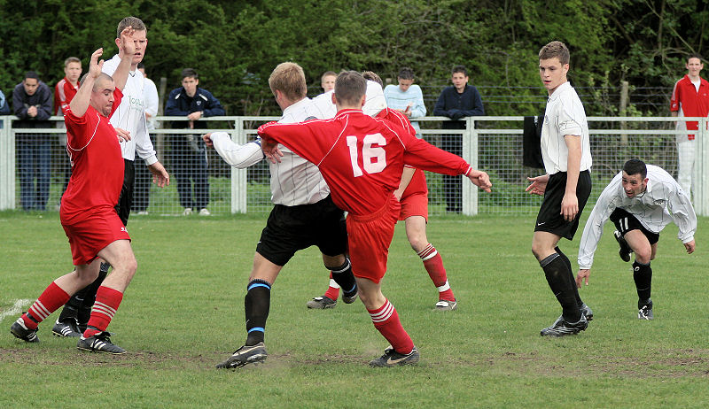 Dave Hall is tackled by Ben Biggar 
