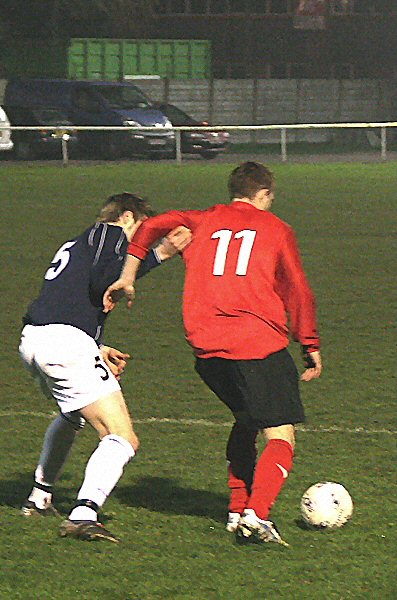 Sean Brownell (5) closes on Danny Curd (11)
