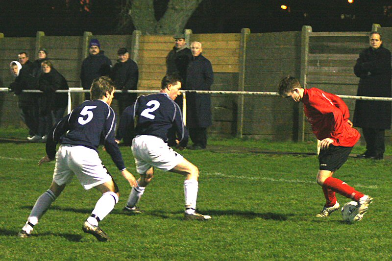 Danny Curd takes on Sean Brownell (5) and Gareth Batty (2)
