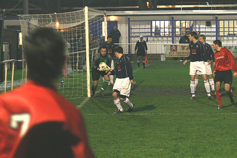 Adam Hunt's (7) corner is collected by Gareth Clarke
