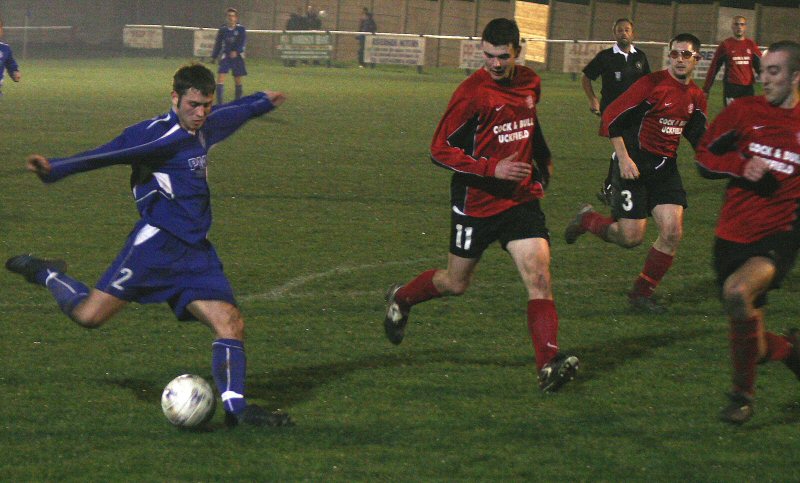 Sean Duffy goes for a cross but Gary Sawyer (extreme right) manages to put the ball out for a corner
