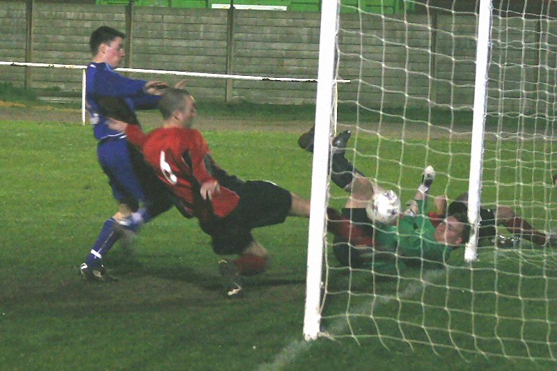 The linesman got it right as Uckfield Town captain Gary Sawyer makes a tremendous clearance off the line
