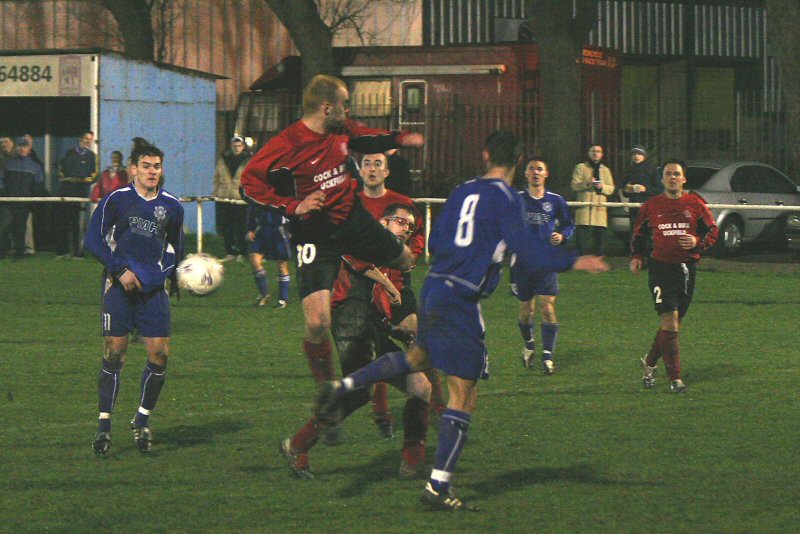 Craig Brown (10) wins the ball but it drops to Craig Cox
