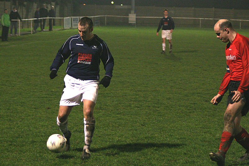 Andy Johnson closely watched by Tony Miles
