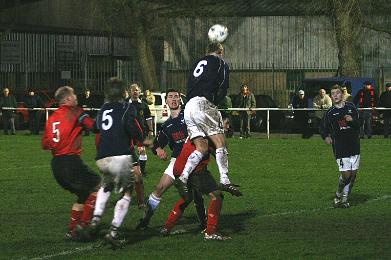 Justin Harris gets in a vital header
