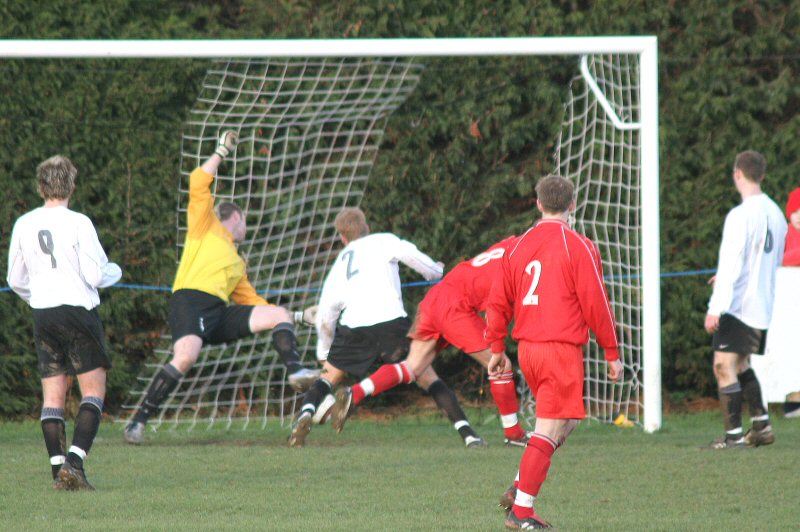 Justin Jones (8) beats the East Preston defence to open the scoring for Redhill
