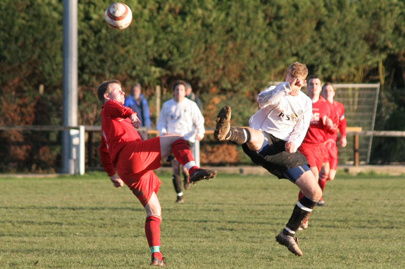 Lee Farrell (right) challenges Ollie West
