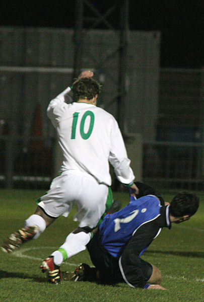 Neil Murfin (10) is tackled by Stuart Day
