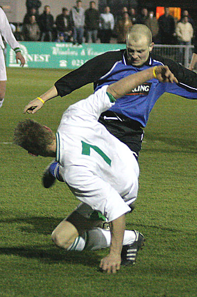 Tough tackling by Alex Ward (7) and Chris Heighes
