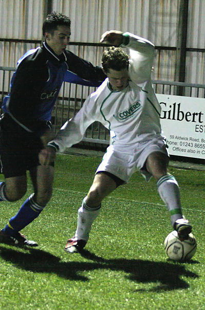 Neil Murfin about to be tackled by Stuart Day
