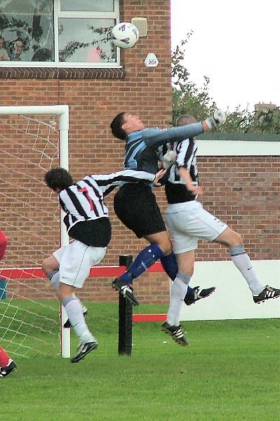 Simon Davey gets above the Peacehaven attack
