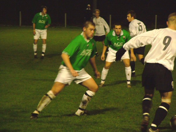 Lee Farrell is closed down by Pagham defenders
