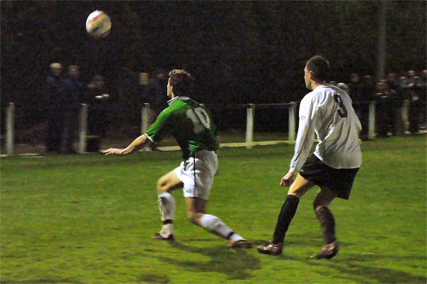 Pagham's Joe Leggatt (10) is closely watched by Josh Sutcliffe (3) 
