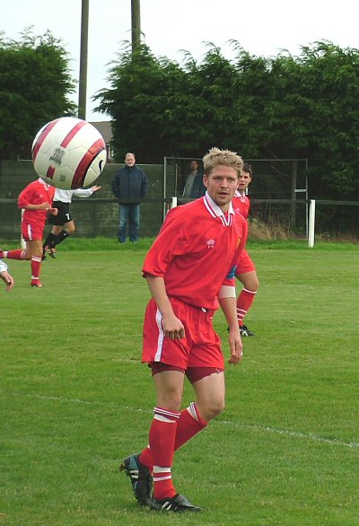 Stuart Bamford watches the ball go out for a kick

