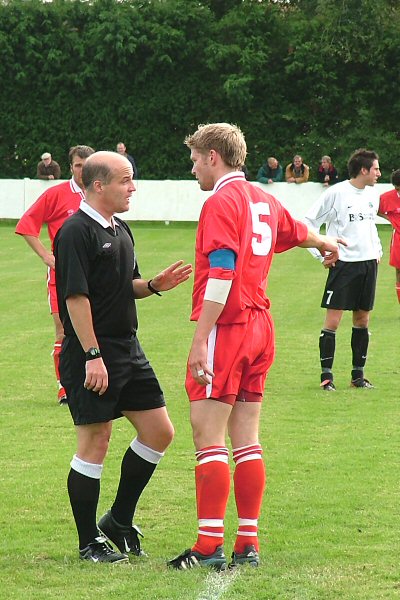 The referee has a word with Stuart Bamford
