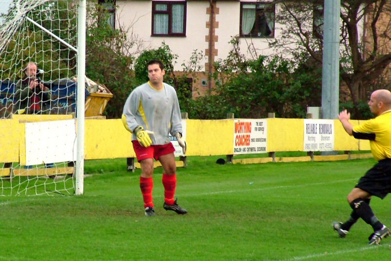 Wayne Collins watches as Daren Pearce puts the ball wide
