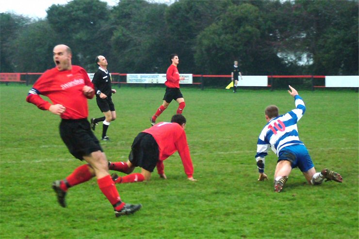 Tony Miles is not happy about the tackle on Marc Cooper
