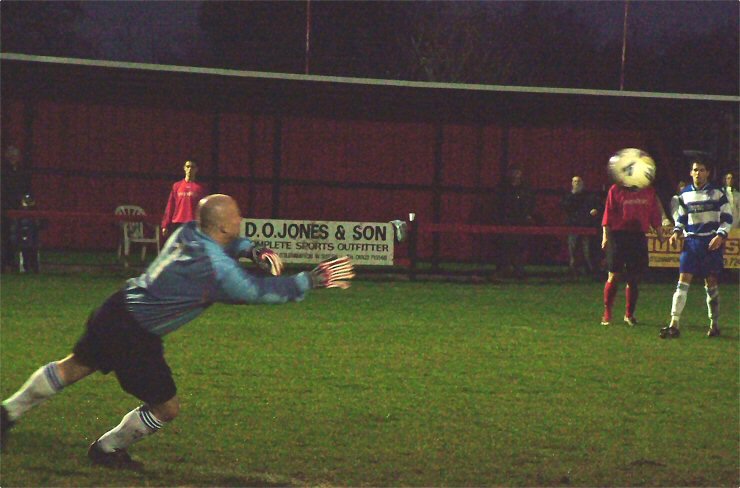 Ashley Walker in the Saltdean goal has this shot covered

