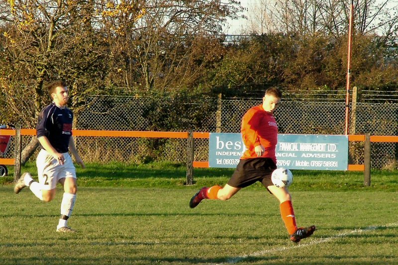 Danny Curd leaves his marker for a crack at goal, saved
