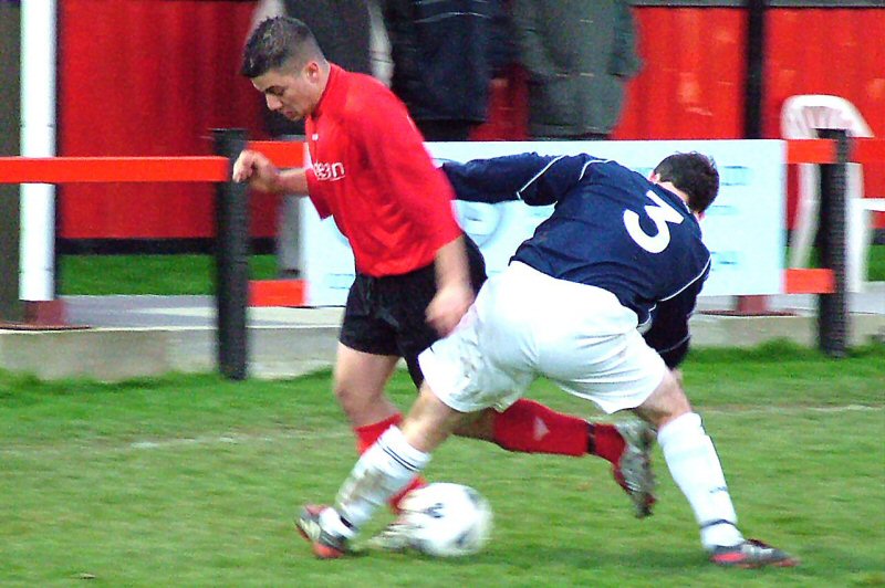 Craig Ottley (3) tackles Wick's Hassan Yassan 
