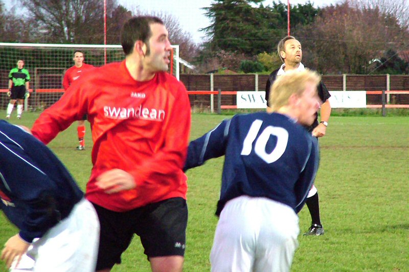 Pete Christodolou beats Justin Harris to head across the area
